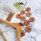 Red Cedarwood Disks by Iris Hantverk
