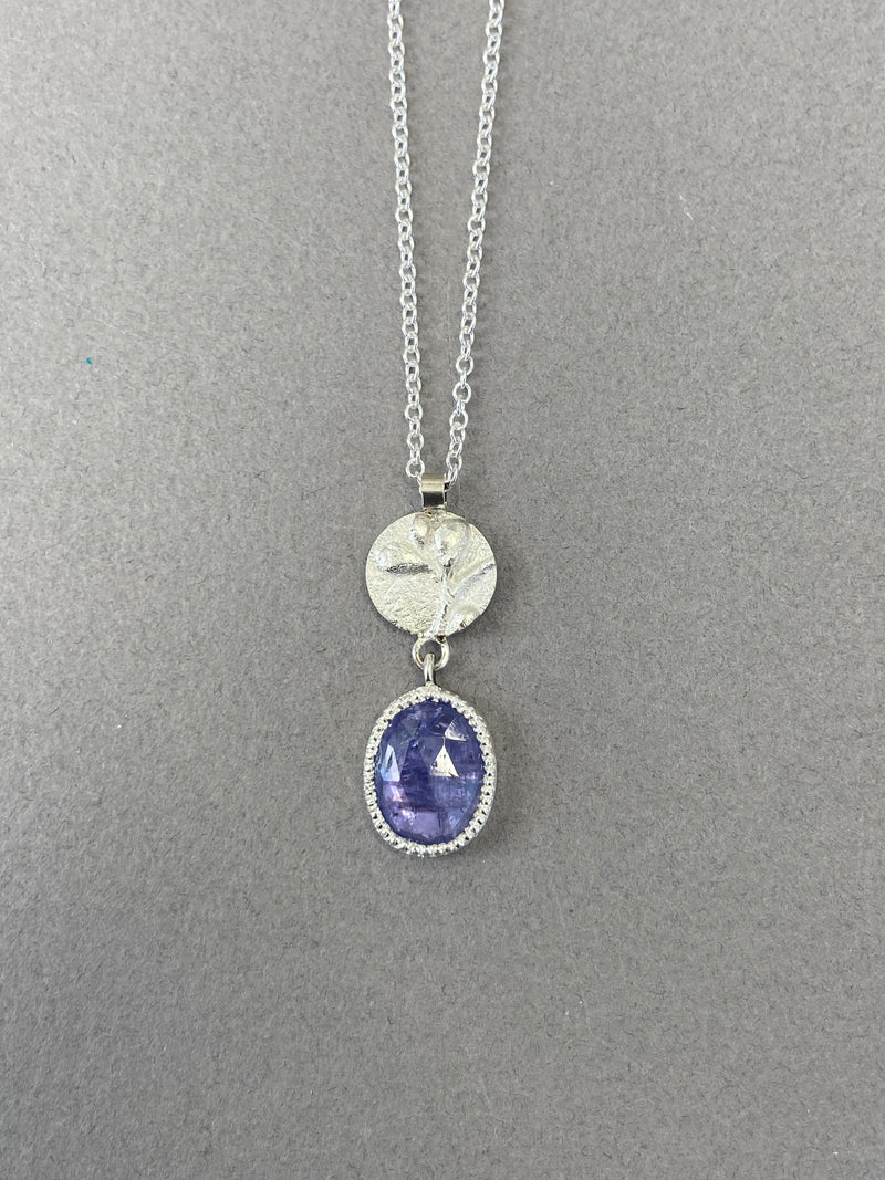 Andrea Mueller -  Round Floral Relief with Tanzanite - Necklace